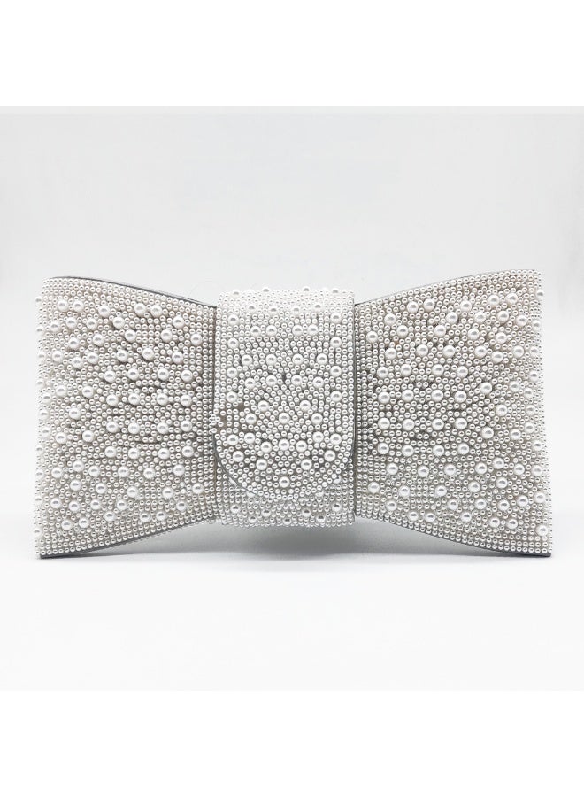 She pearl bow clutch - Image 1